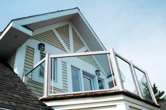 Modern Aluminum Railing with Glass frame installed on an upper-level deck